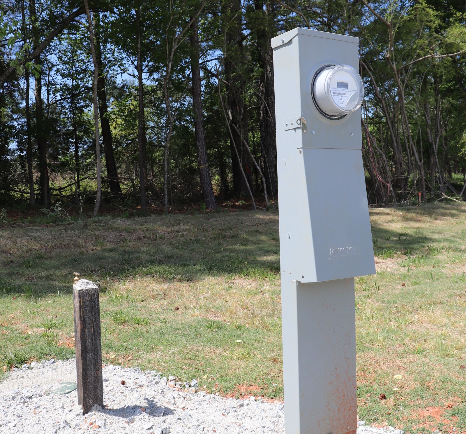 Power pedestal and water hookup at an RV site