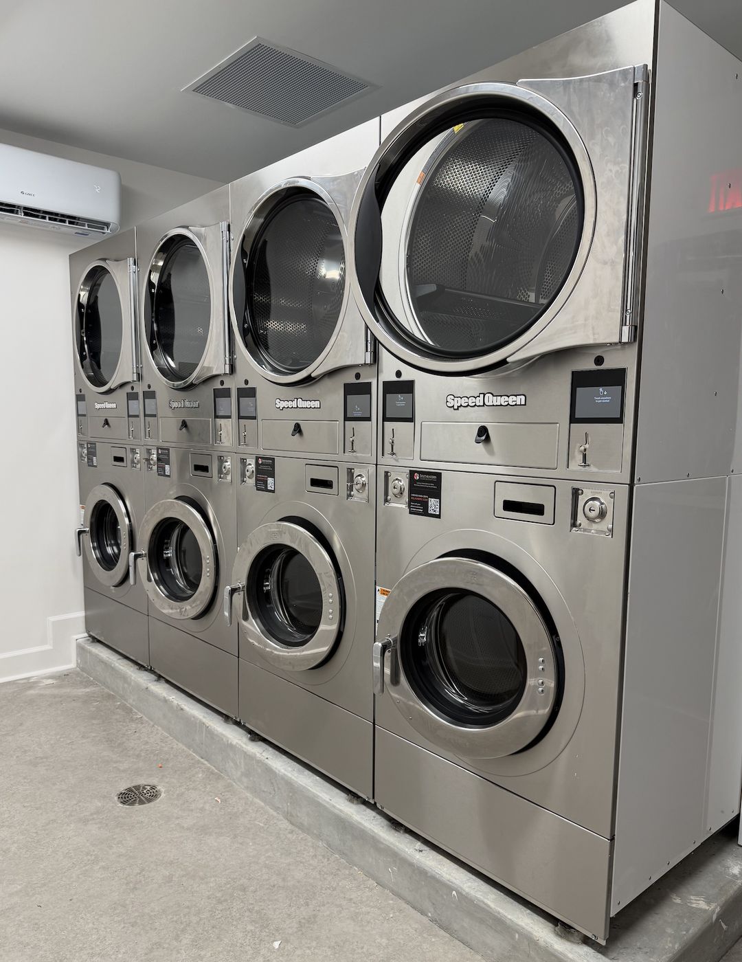 Commercial washers and dryers in the on-site laundry