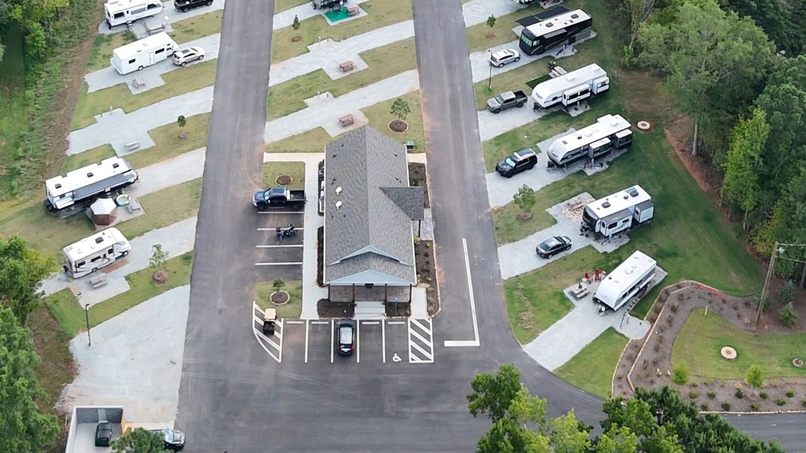 Aerial view of the new bath house and gravel RV sites
